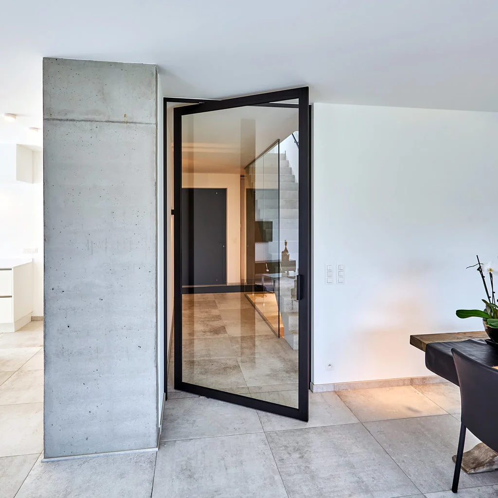 Steel-look pivot interior door