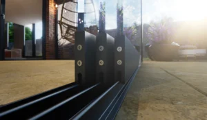 Side view of the black rails of glass sliding walls